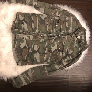 Camo button up shirt or sweater.